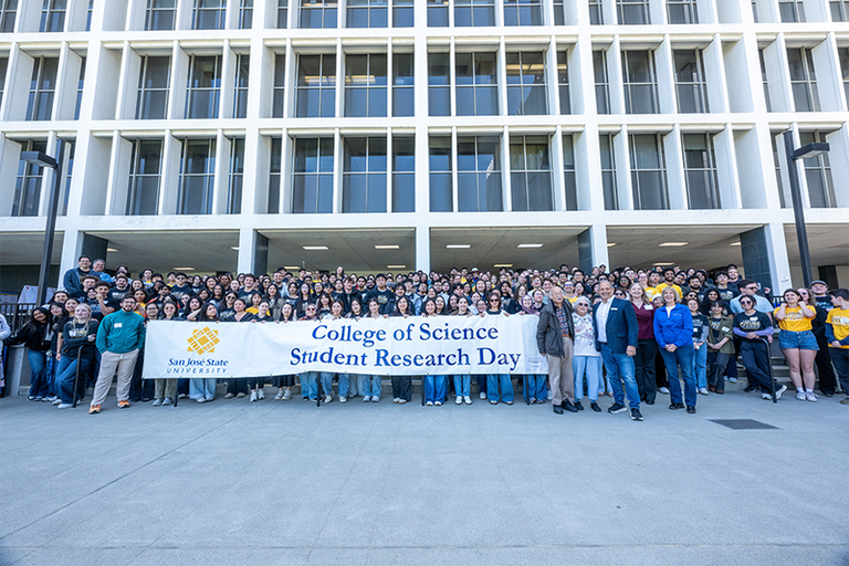 Students gathered together for a group photo for student research day